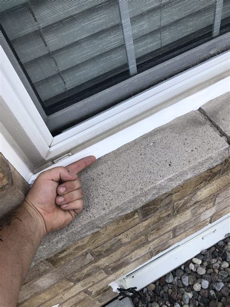 caulking holes around windows